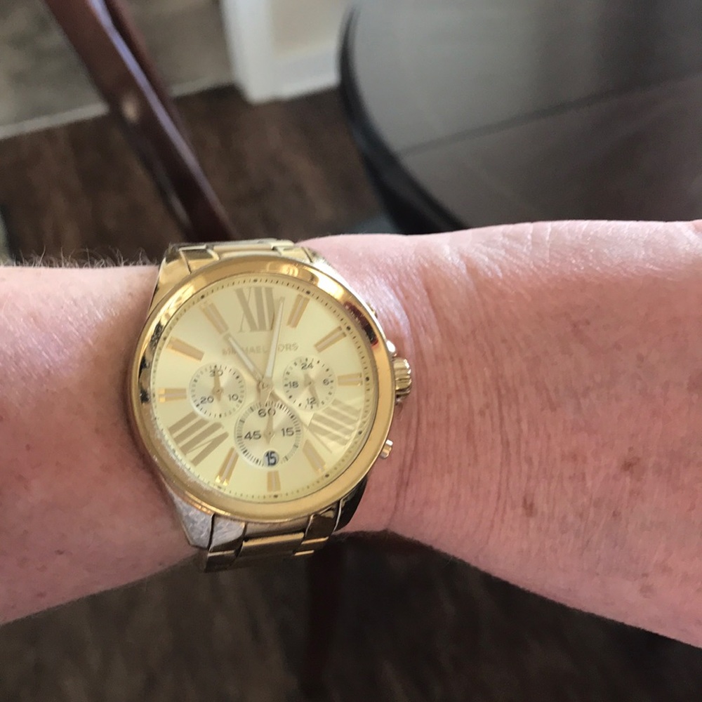 Gold Michael Kors watch used but flawless!